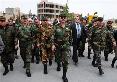 La bandera siria ondea en la ciudad recuperada